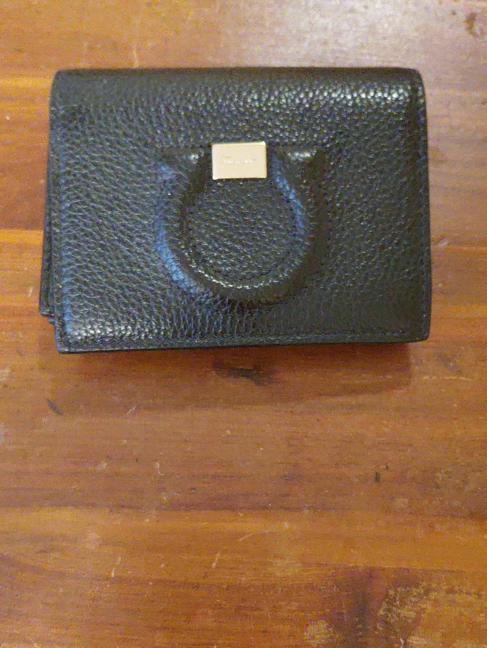 Salvatore Ferragamo Black Pebbled Leather Wallet with Gold Plaque